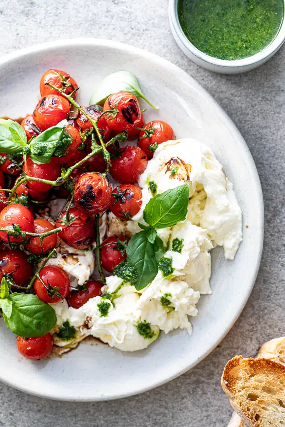 Grilled tomato caprese salad