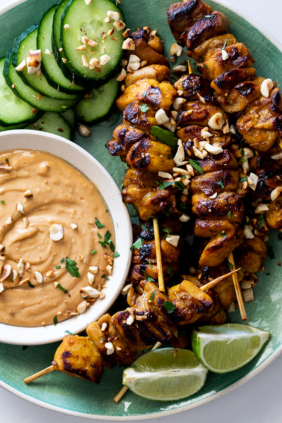 Grilled chicken satay skewers with peanut dipping sauce