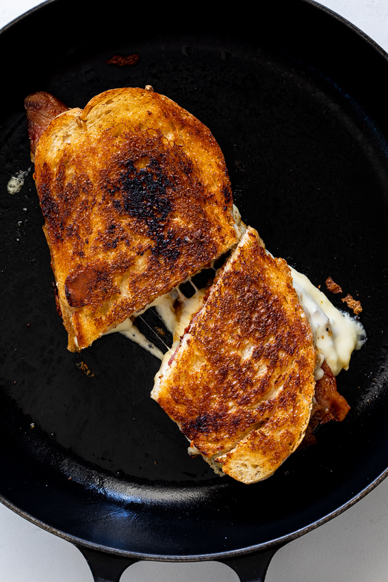 Crispy bacon brie grilled cheese sandwich with caramelised onions ...