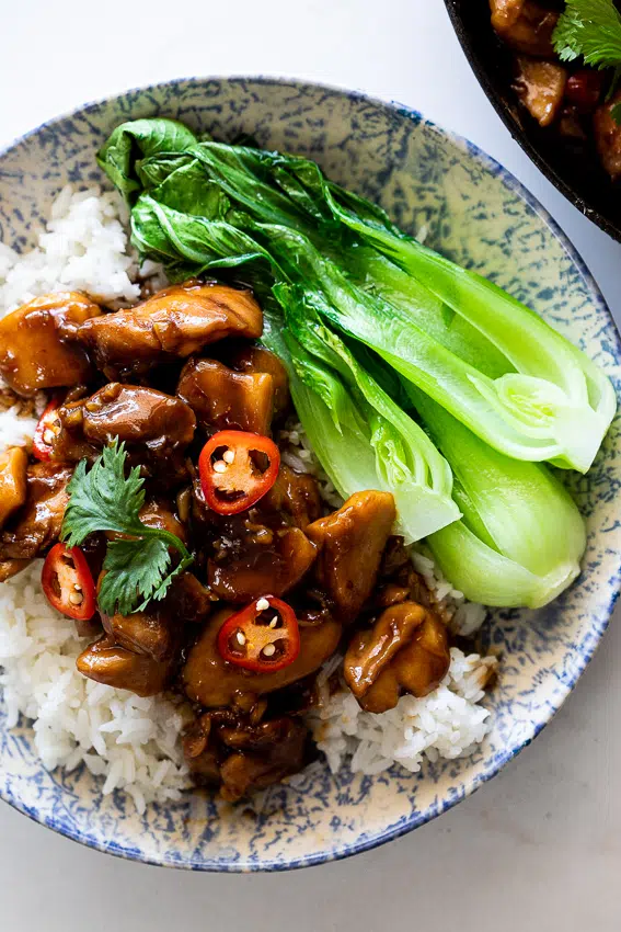 Easy sticky ginger chicken on rice with greens