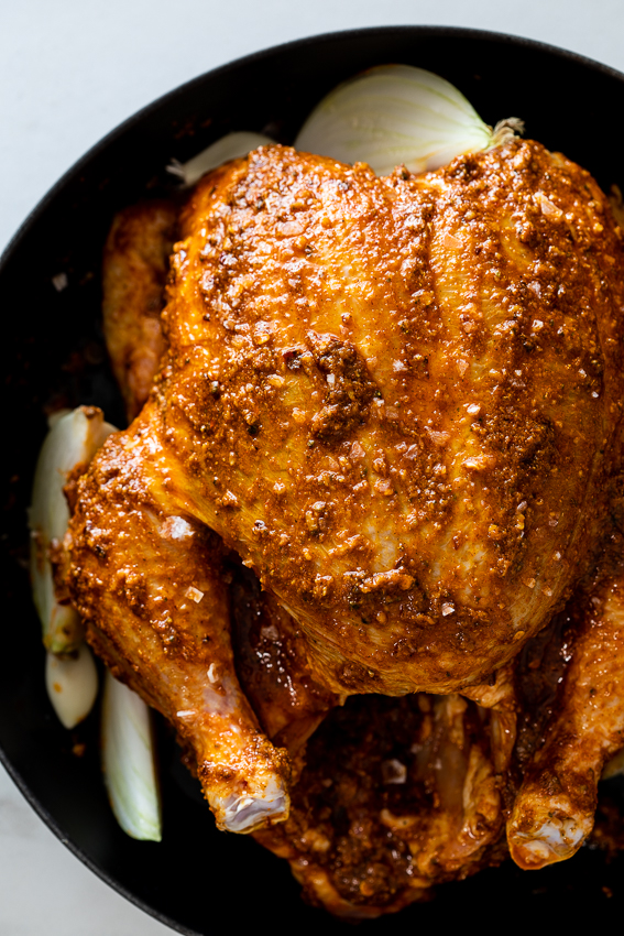 Chicken rubbed with curry spices.