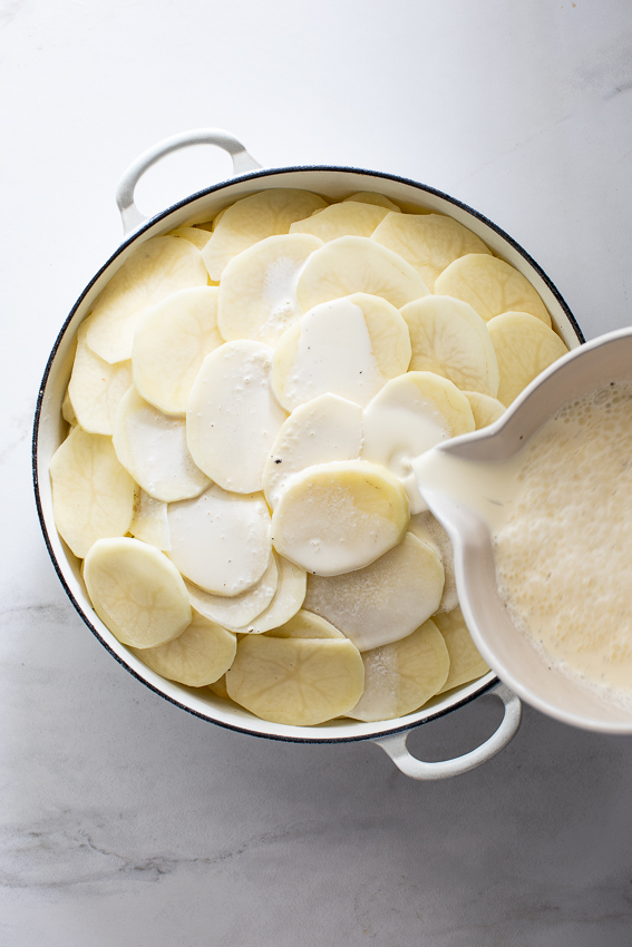 Potatoes layered with cheese, garlic and cream.