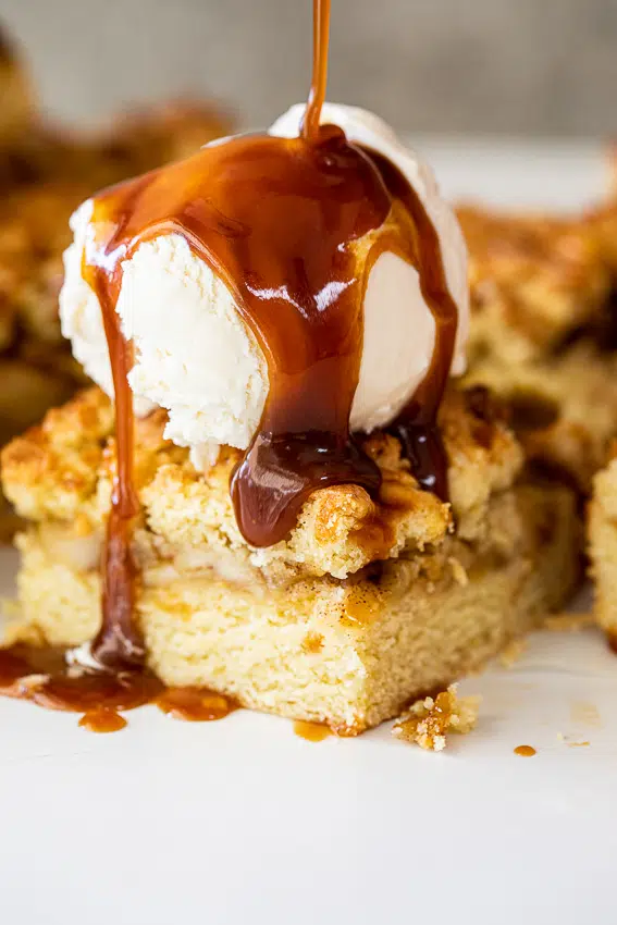 Apple crumble bars with salted caramel and vanilla ice cream.