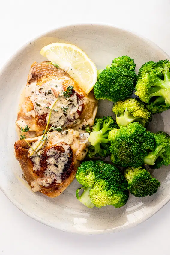 Baked chicken with steamed broccoli.