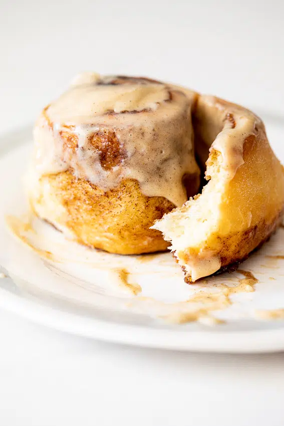 Soft and fluffy cinnamon rolls with chai icing.
