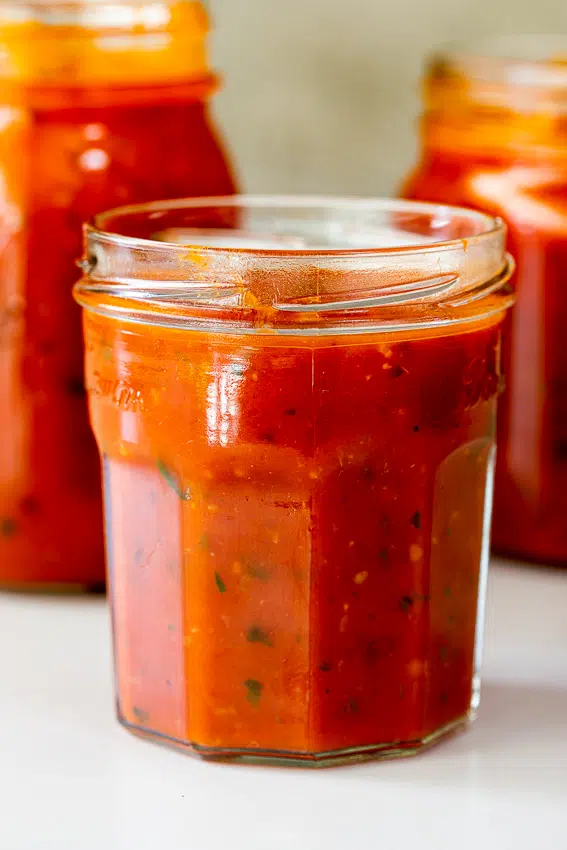 Marinara sauce in jars.