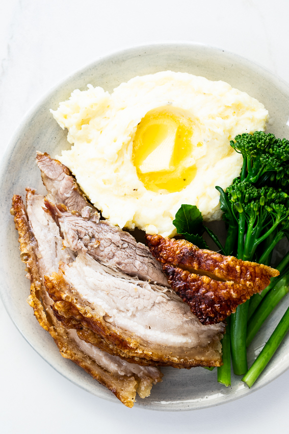 Salt and pepper pork belly with mash and greens. 