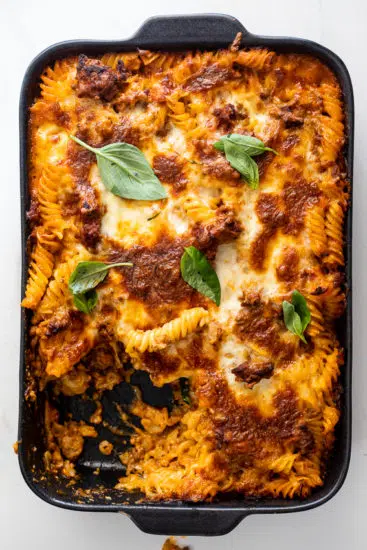 Bolognese pasta bake with fresh basil
