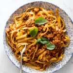 Bolognese sauce with pasta in bowl.