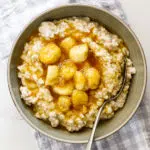 Creamy healthy oatmeal with maple bananas
