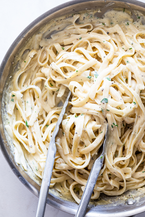 Pasta with creamy lemon pepper sauce.