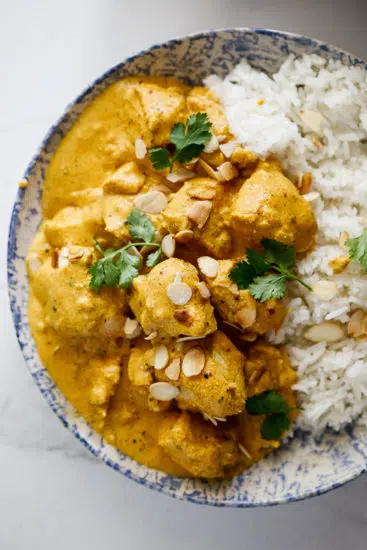 Creamy Mughlai chicken with rice.