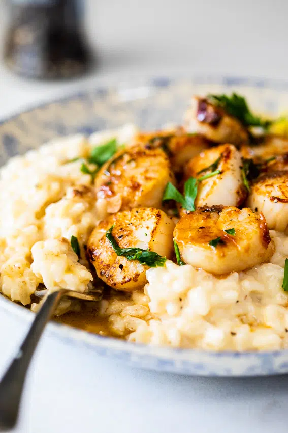 Scallops with creamy risotto.