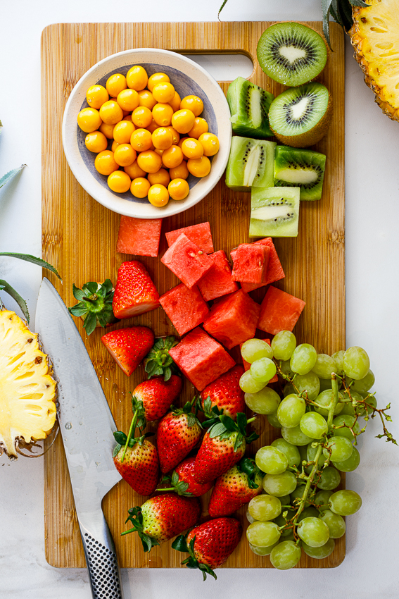 Fresh fruit on chopping board. 