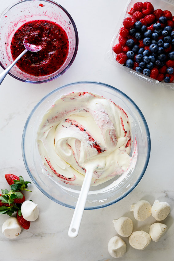 Whipped cream rippled with fresh berry sauce.