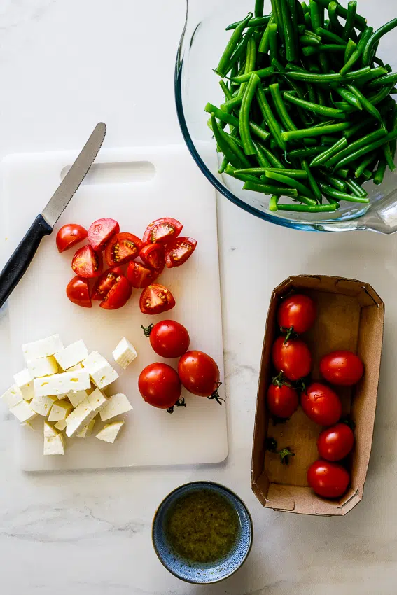 Tomatoes, feta and blanched green beans.