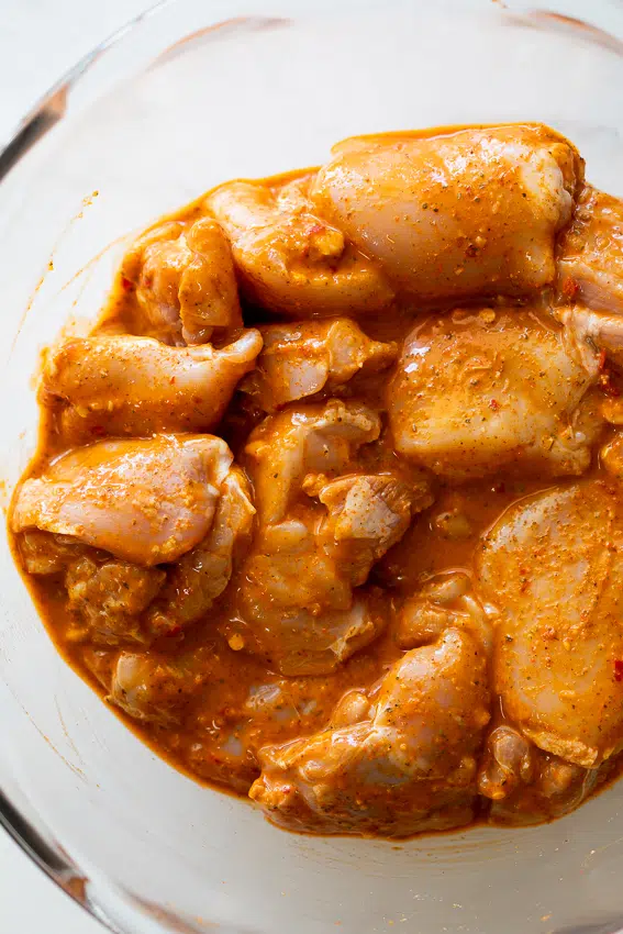 Chicken thighs marinated in Peri-Peri sauce.