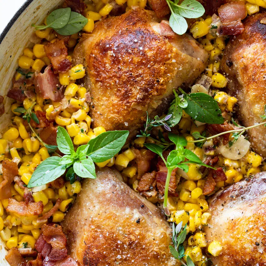 Bacon creamed corn with crispy chicken thighs