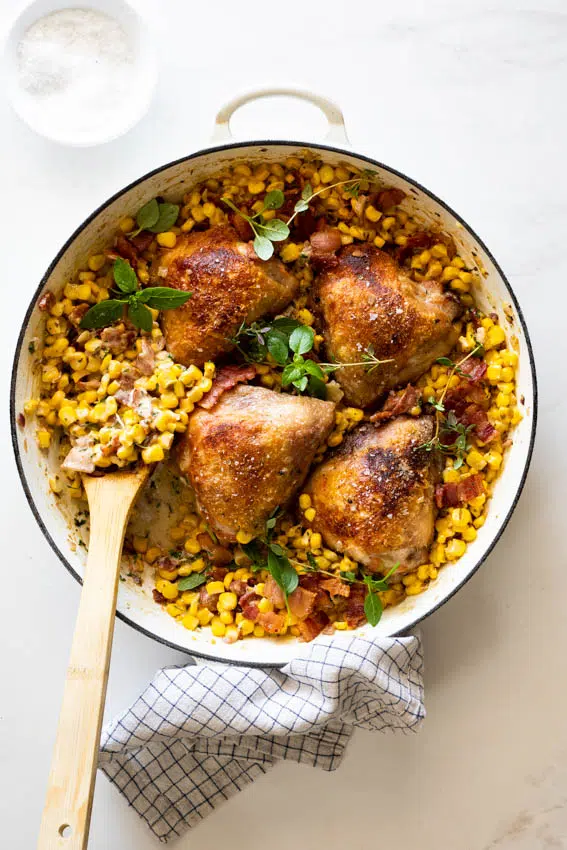 Bacon creamed corn with crispy chicken thighs