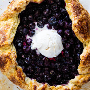 Blueberry galette with ice cream.