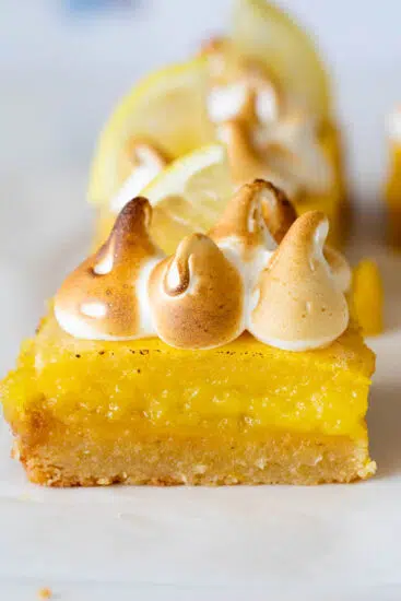 Gooey lemon bars with torched meringue.