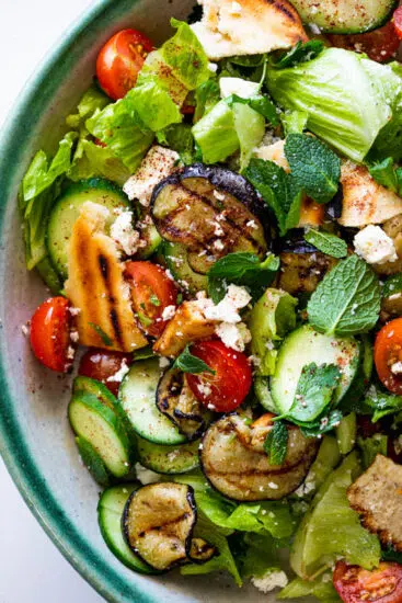 Salad with grilled pita bread, eggplant and feta cheese.