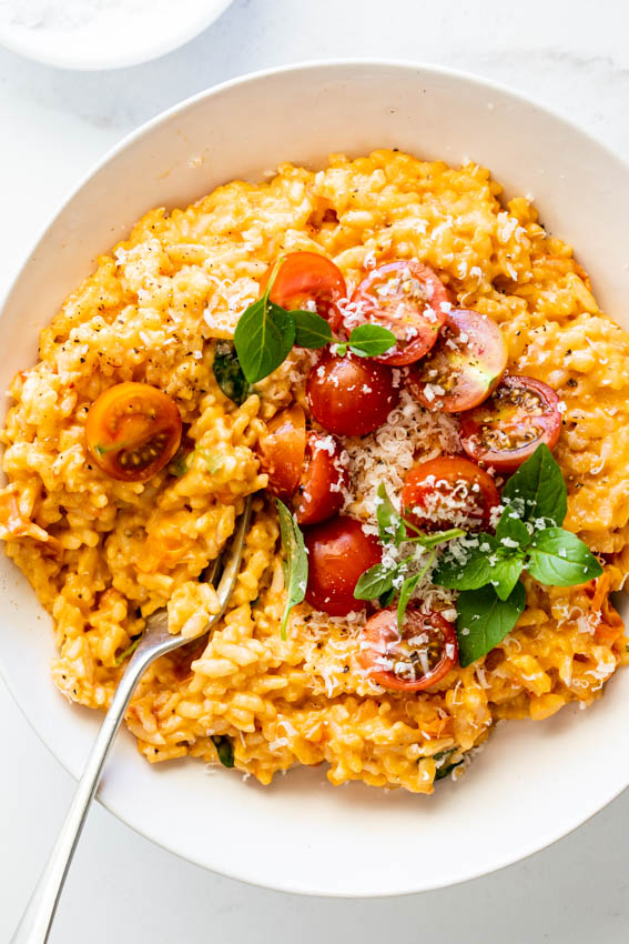 Instant pot tomato risotto with fresh basil and Parmesan.