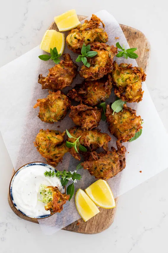 Cheesy zucchini fritters with garlic yogurt dip