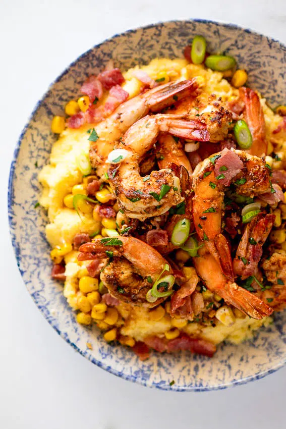 Shrimp and grits with bacon and corn
