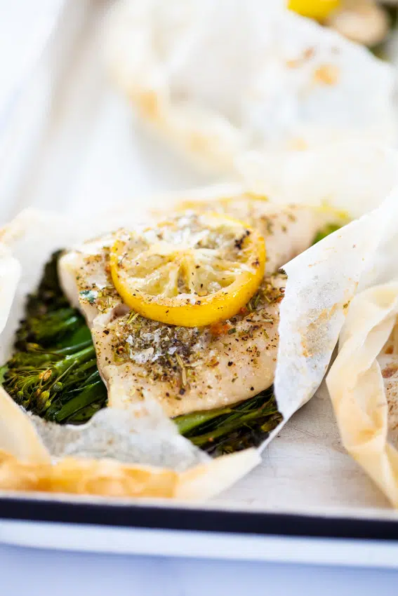 Garlic butter Fish en papillote with vegetables.