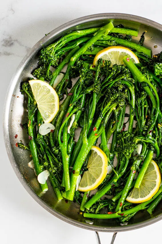 10-minute lemon garlic sautéed broccolini in pan.