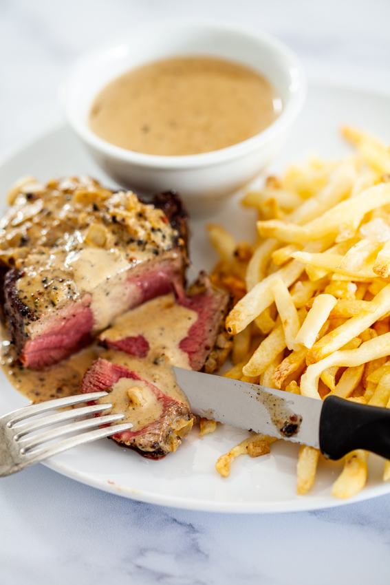 Steak au Poivre is perfect served with frites and creamy pepper sauce.