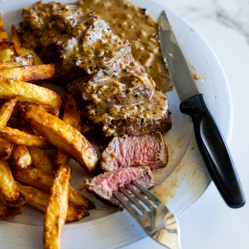 Steak au Poivre with fries.