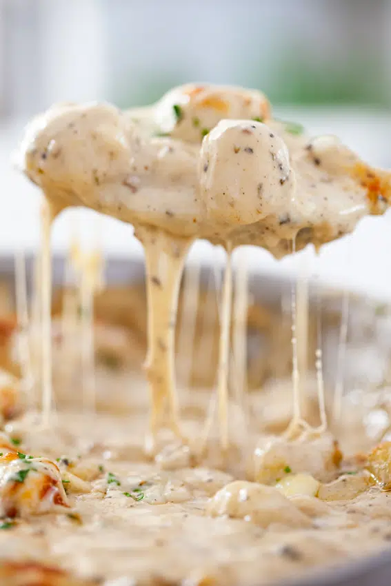 Cheesy baked gnocchi with cheesy pepper sauce.