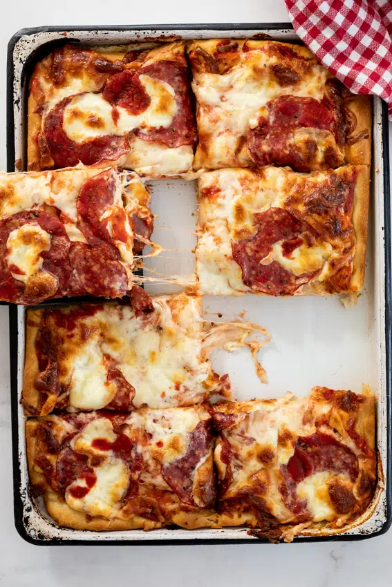 Super cheese pan pizza with salami.