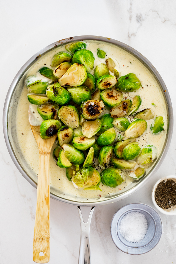 Sauteed Brussel sprouts in creamy Parmesan sauce.