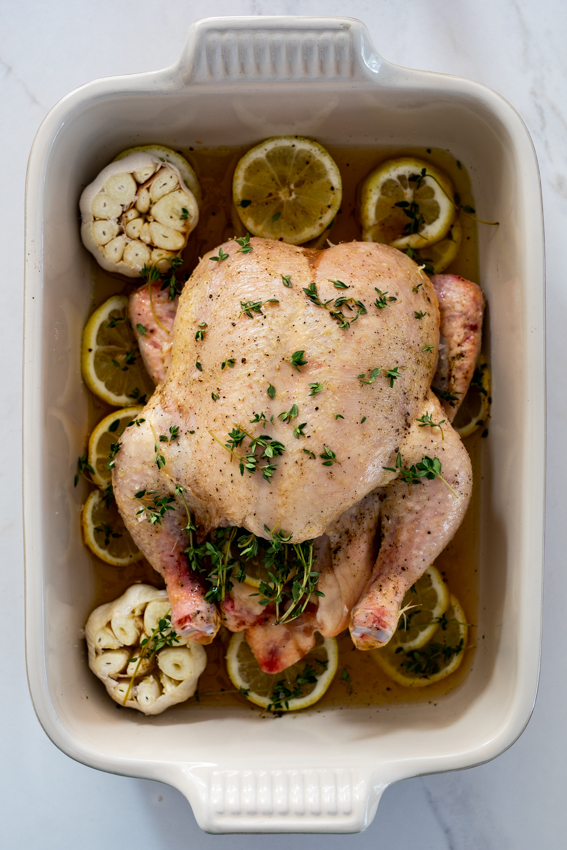 Chicken seasoned with thyme, roasted with lemon and garlic.
