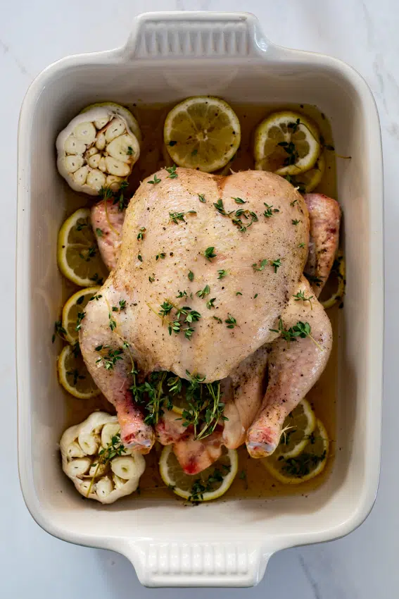 Chicken seasoned with thyme, roasted with lemon and garlic.