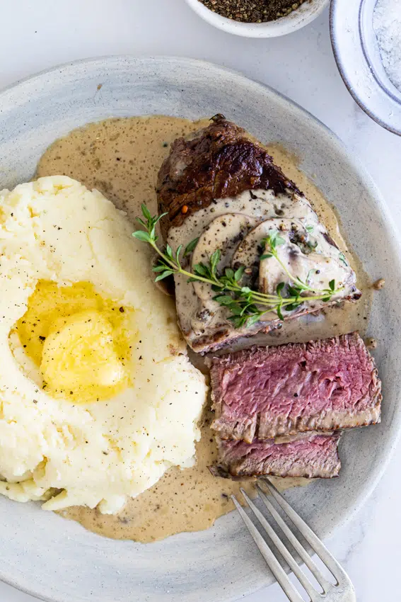 Perfectly cooked beef fillet with truffled mushrom sauce and mashed potatoes.