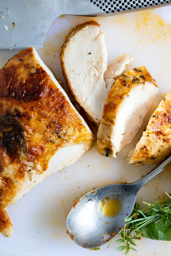 Juicy roast turkey flavored with garlic and herbs.