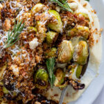 Roasted Brussels Sprouts on Cheese sauce with Prosciutto crumbs