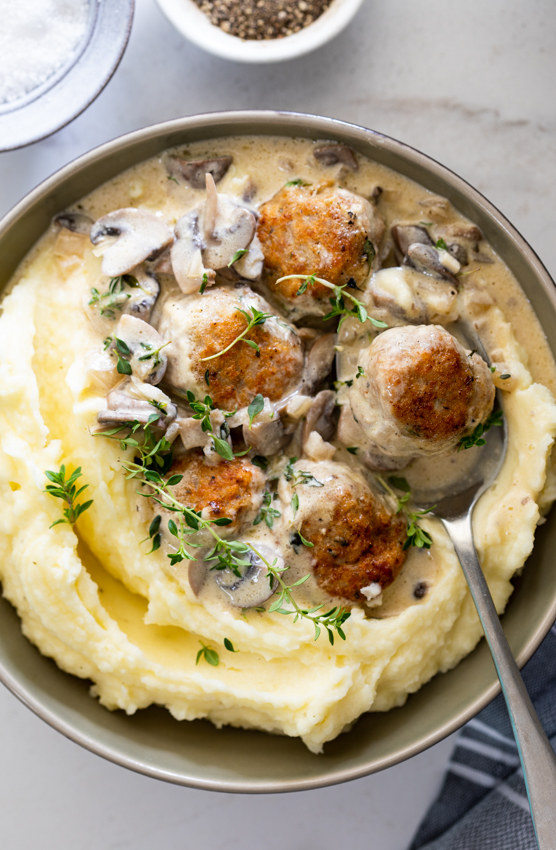 Coq au vin blanc meatballs with creamy mashed potatoes