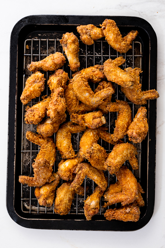 Crispy fried chicken wings.