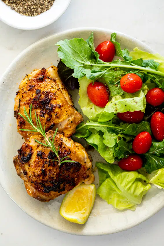 Lemon Rosemary Air fryer chicken thighs with salad