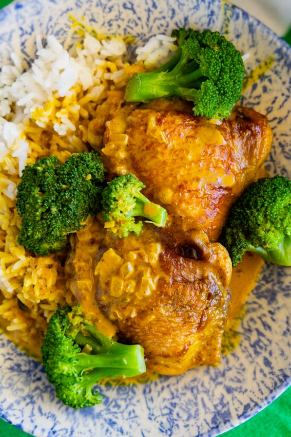 Coconut curry chicken thighs and broccoli on rice.