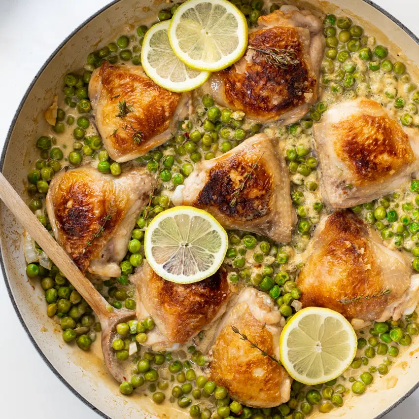 Crispy chicken thighs with lemony creamed peas