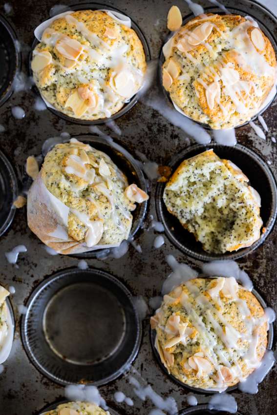 Light and fluffy lemon poppy muffins with lemon glaze.
