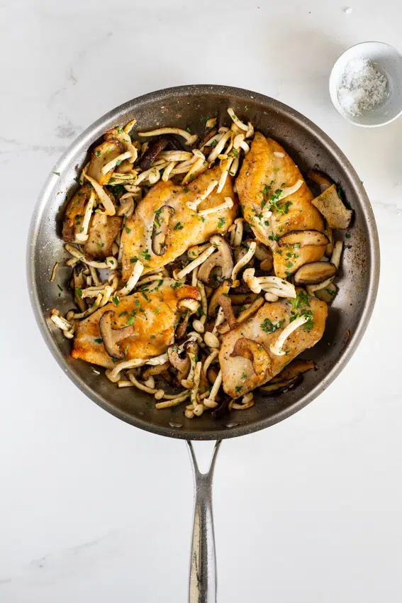Crispy, golden chicken with mushrooms.