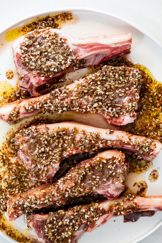 Lamb chops marinated with sumac and sesame seeds.