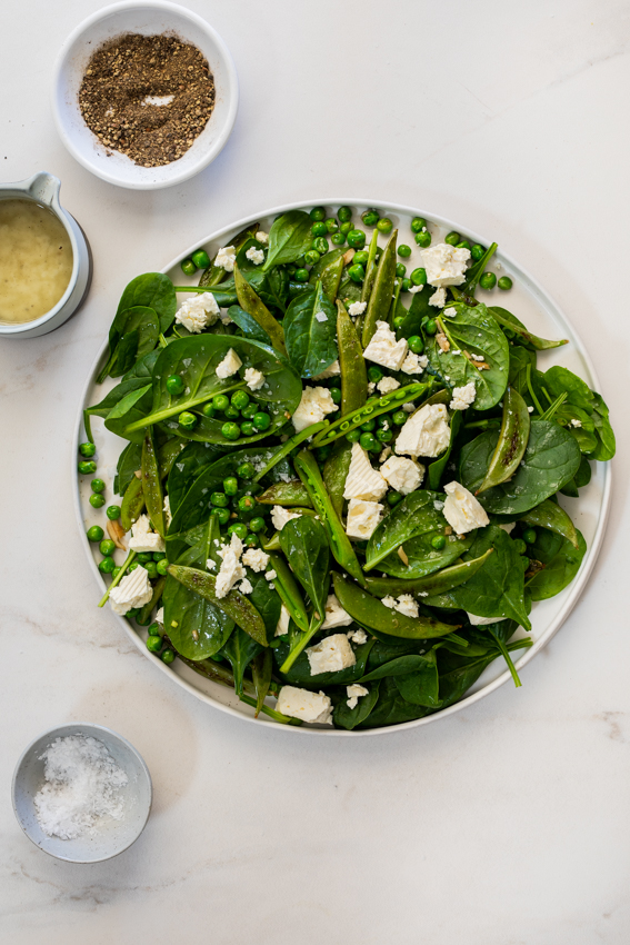 Warm Spinach Salad with Feta and Peas